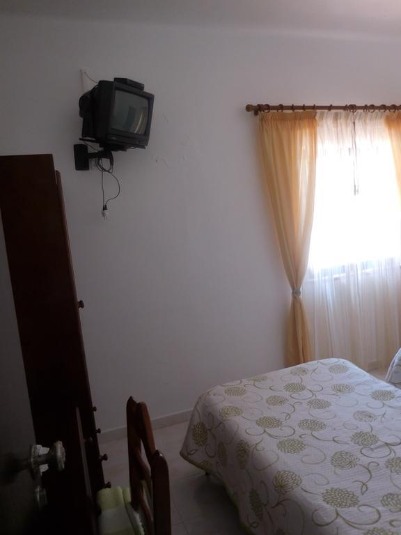 أوديسيكس Guesthouse Luar المظهر الخارجي الصورة